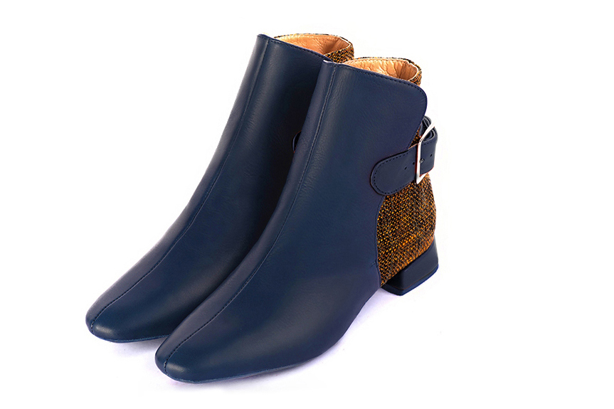 Women's navy blue and terracotta orange elegant ankle boots, with buckles at the back. Square toe. Flat flare heels - Front view